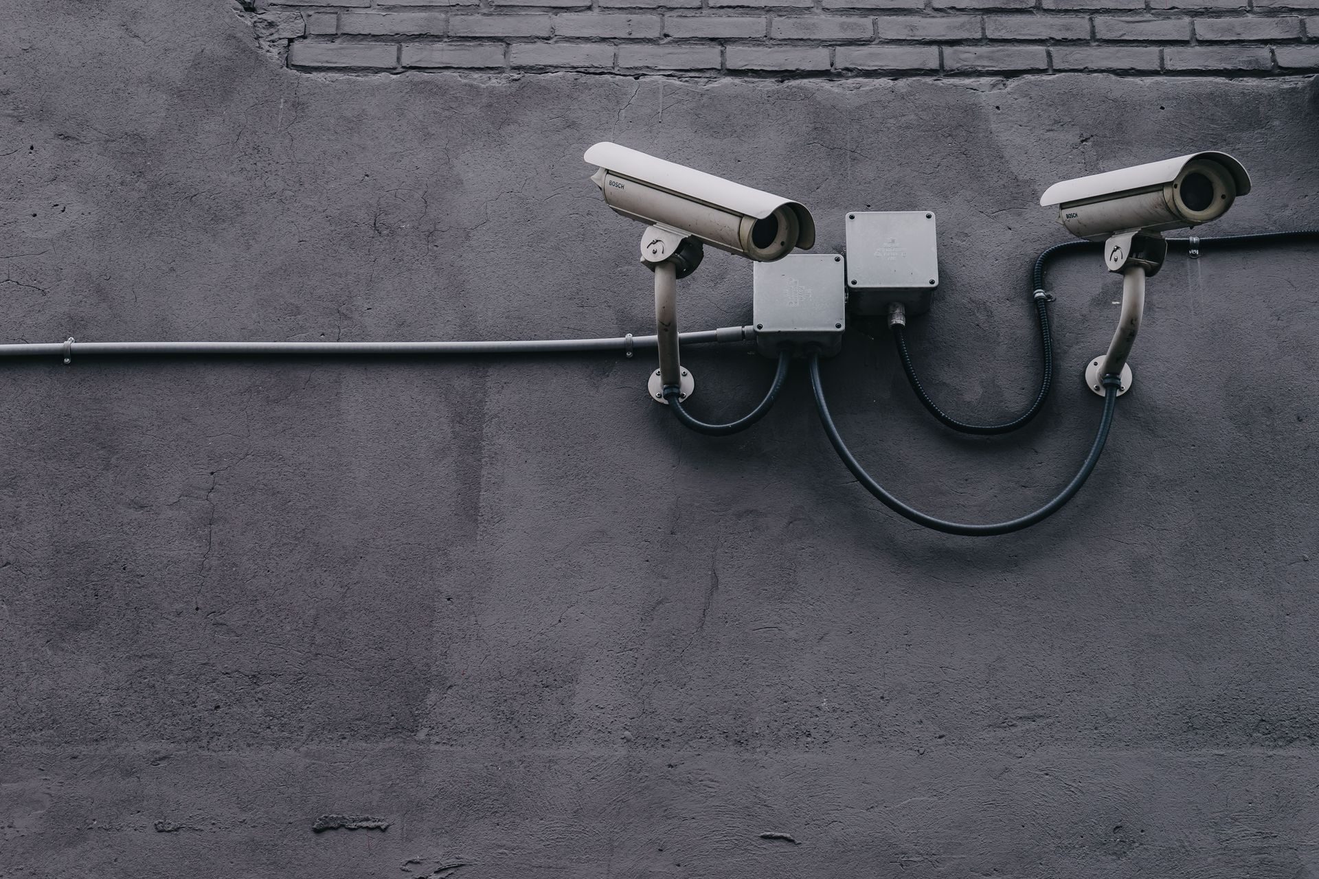 High-definition surveillance CCTV camera representing commercial security systems.